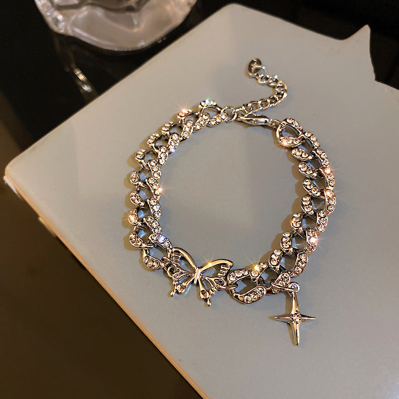 Butterfly cross bracelet in a trendy design, elegant style