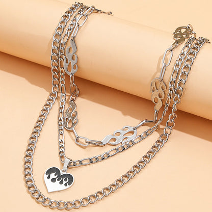 Striking multi-layered women's necklace with flame and heart motif