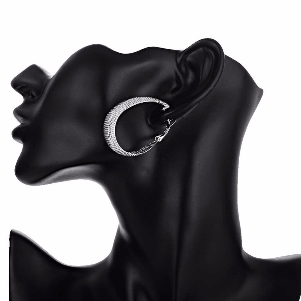 Fashionable, creative large hoop earrings with a matte finish.