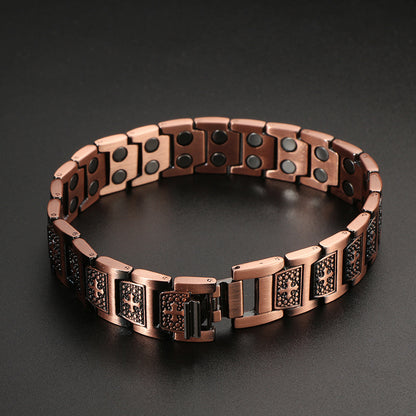 Kupferarmband mit Magnet und Kreuzmotiv