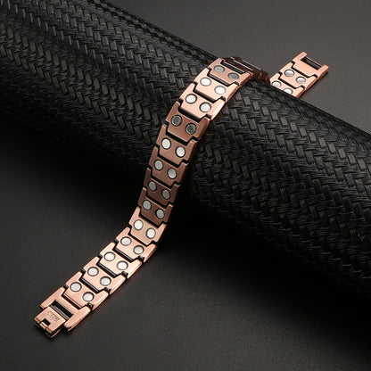 Kupferarmband mit Magnet und Kreuzmotiv