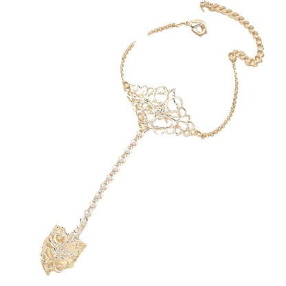 Minimalist, slightly luxurious bangle bracelet with window cutout and patterned design