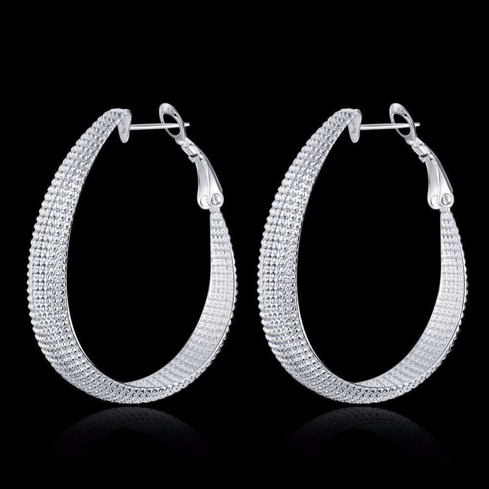 Fashionable, creative large hoop earrings with a matte finish.