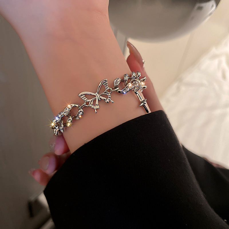 Butterfly cross bracelet in a trendy design, elegant style