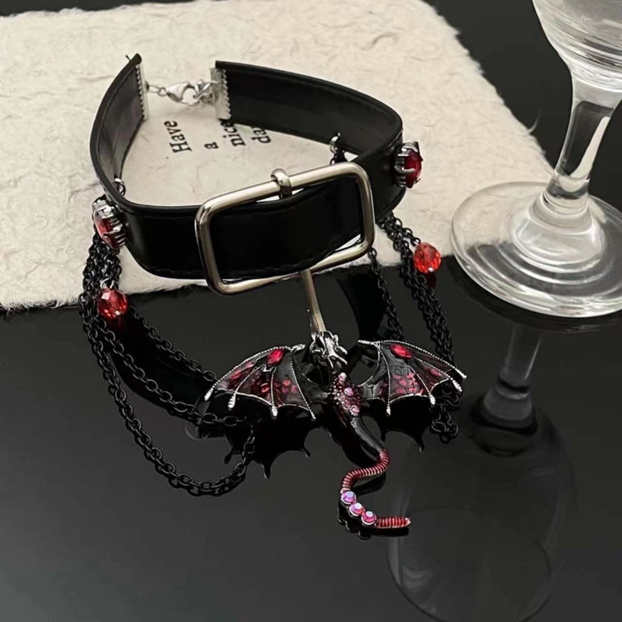 Small dragon choker necklace in dark style with tassel and round beads
