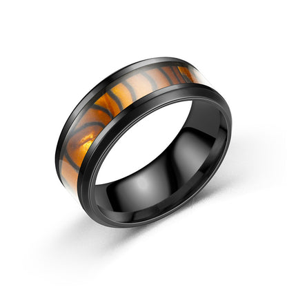 Ring made of titanium steel and stainless steel with a shell design in European and American style