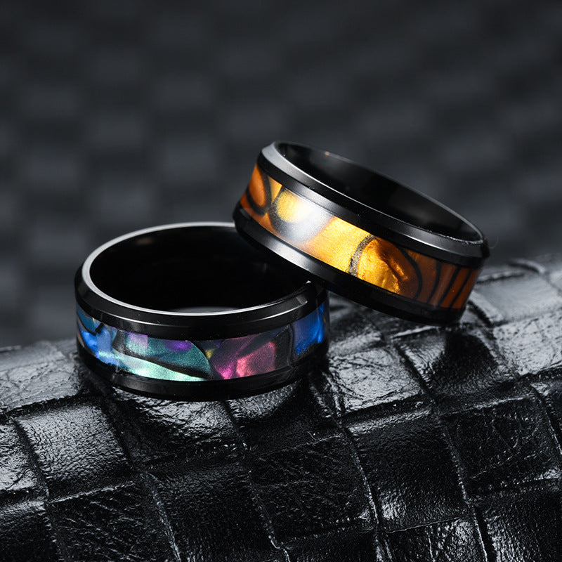 Ring made of titanium steel and stainless steel with a shell design in European and American style