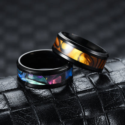 Ring made of titanium steel and stainless steel with a shell design in European and American style