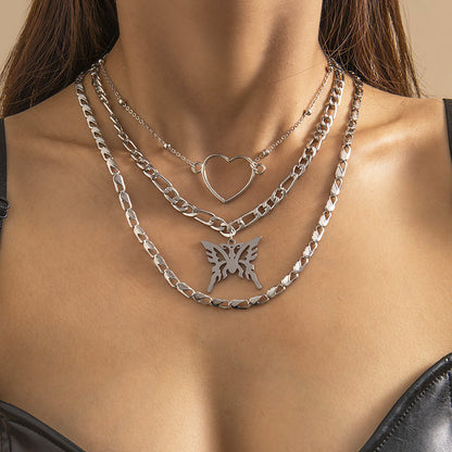 Multi-layered statement necklace with butterfly pendant and heart choker for women