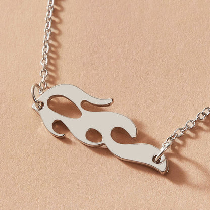 Multi-layered punk choker necklace with flame motif 