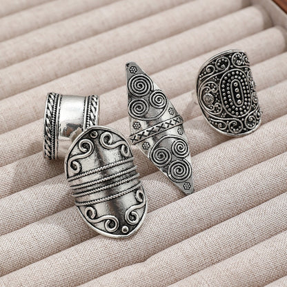 Wide retro thumb ring in punk and hip-hop style, engraved, with a striking design