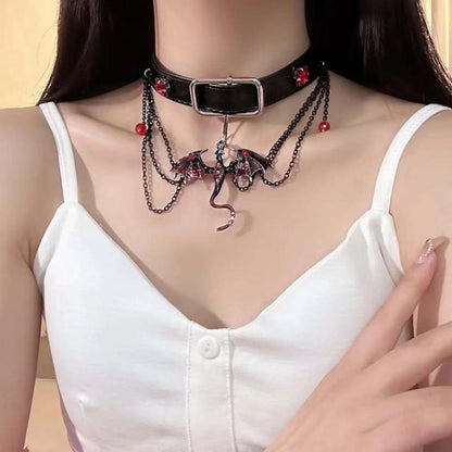Small dragon choker necklace in dark style with tassel and round beads
