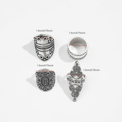 Wide retro thumb ring in punk and hip-hop style, engraved, with a striking design