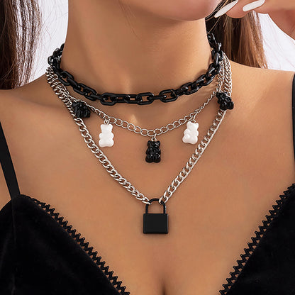 Fashionable multi-layered women's necklace with lock pendant and metal tassels