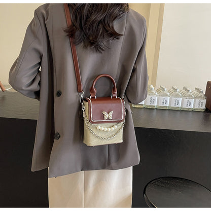 Simple women's crossbody mini bag in vertical format, portable, coin purse